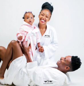 A picture of Eric Omondi with his wife and kid