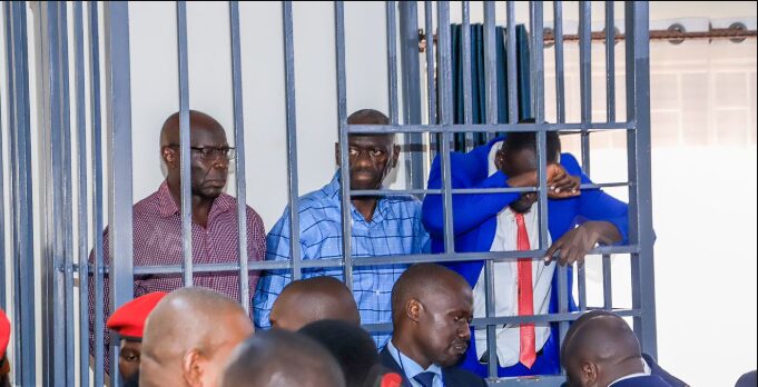 An image of Besigye and Lawyers behind bars